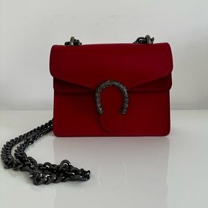 Red leather handbag